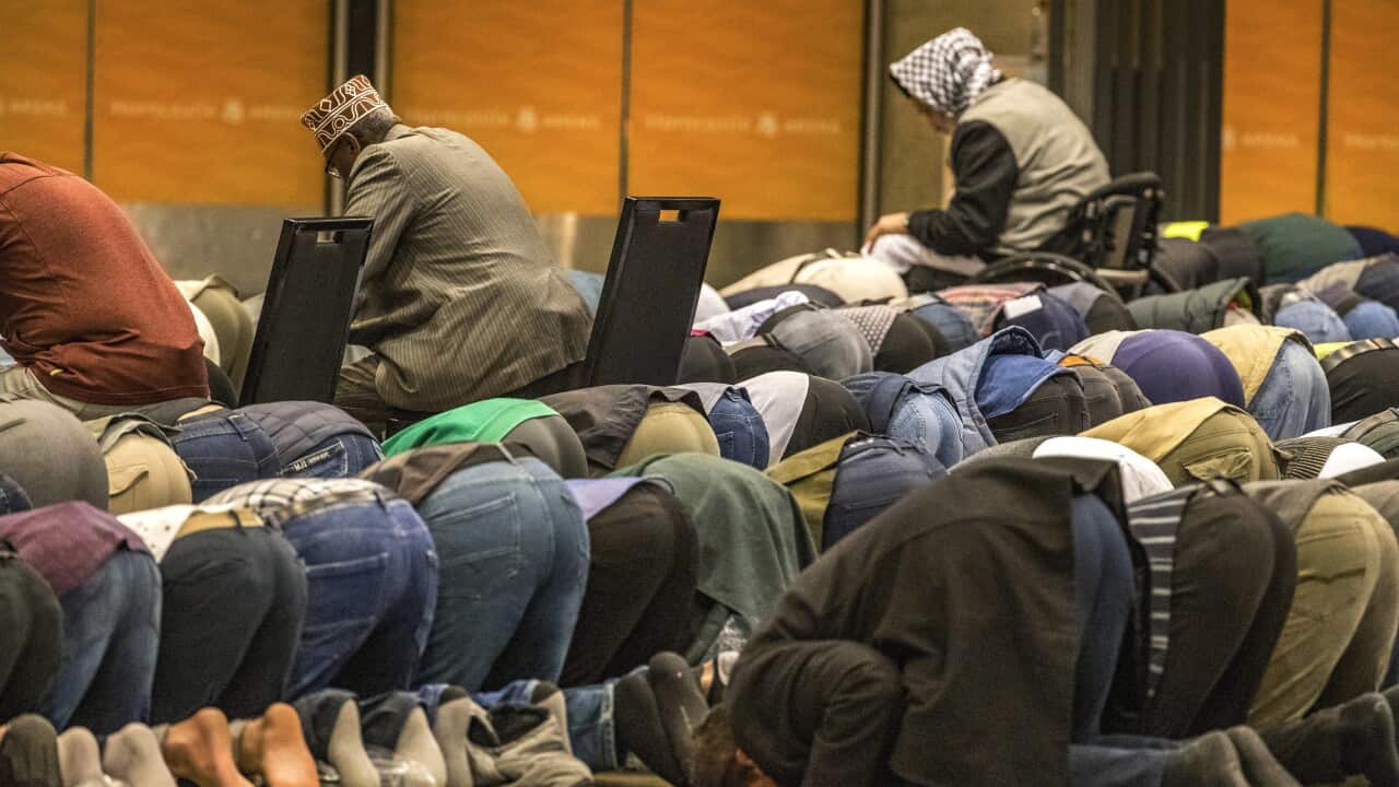 Muslims bow during Friday prayers in Christchurch, New Zealand, Friday, March 13, 2020.