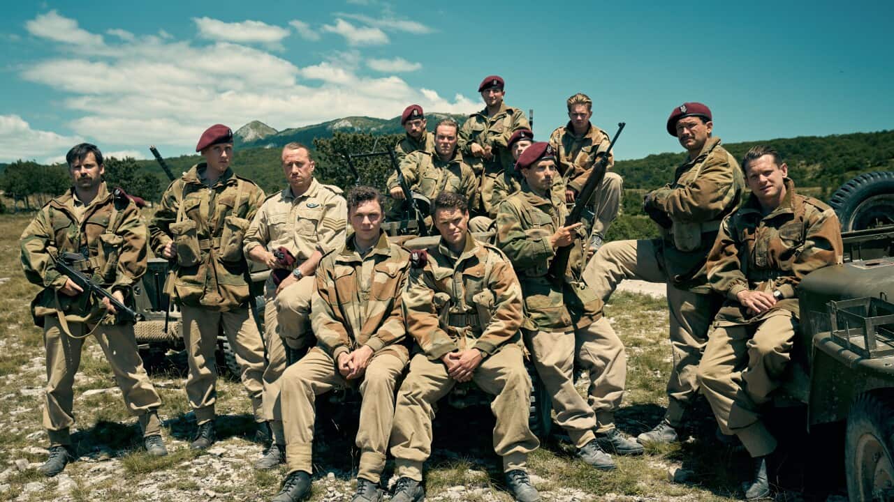 The cast of Rogue Heroes 2. Jim Almonds played by Corin Silva, Johnny Cooper played by Jacob McCarthy, Reg Seekings played by Theo Barklem-Biggs, Suport actor, Dave Kershaw played by Bobby Schofield, Pat Rile played by Jacob Ifan, Jock McDiarmid played by Mark Rowley and Paddy Mayne played by Jack O'Connell.