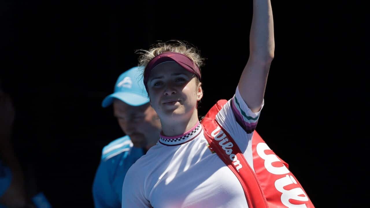 Ukraine's Elina Svitolina waves as she leaves Rod Laver Arena following her quarterfinal loss to Japan's Naomi Osaka at the Australian Open tennis championships in Melbourne, Australia, Wednesday, Jan. 23, 2019. (AP Photo/Kin Cheung)