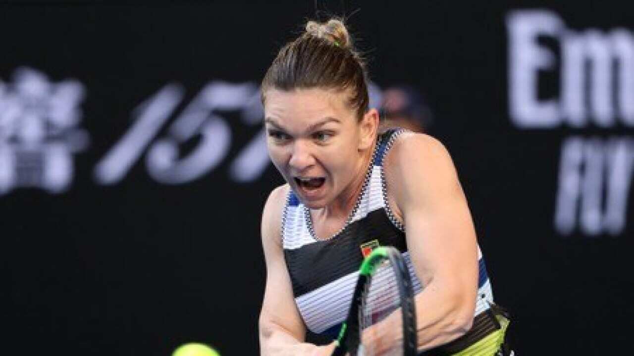 Top seed Halep marches on with clinical win over Venus