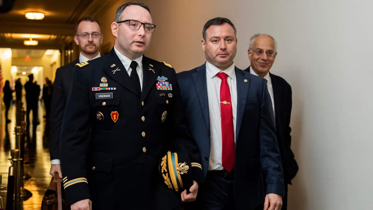 Lt. Col. Alexander Vindman leaves Capitol Hill after testifying at the impeachment hearing