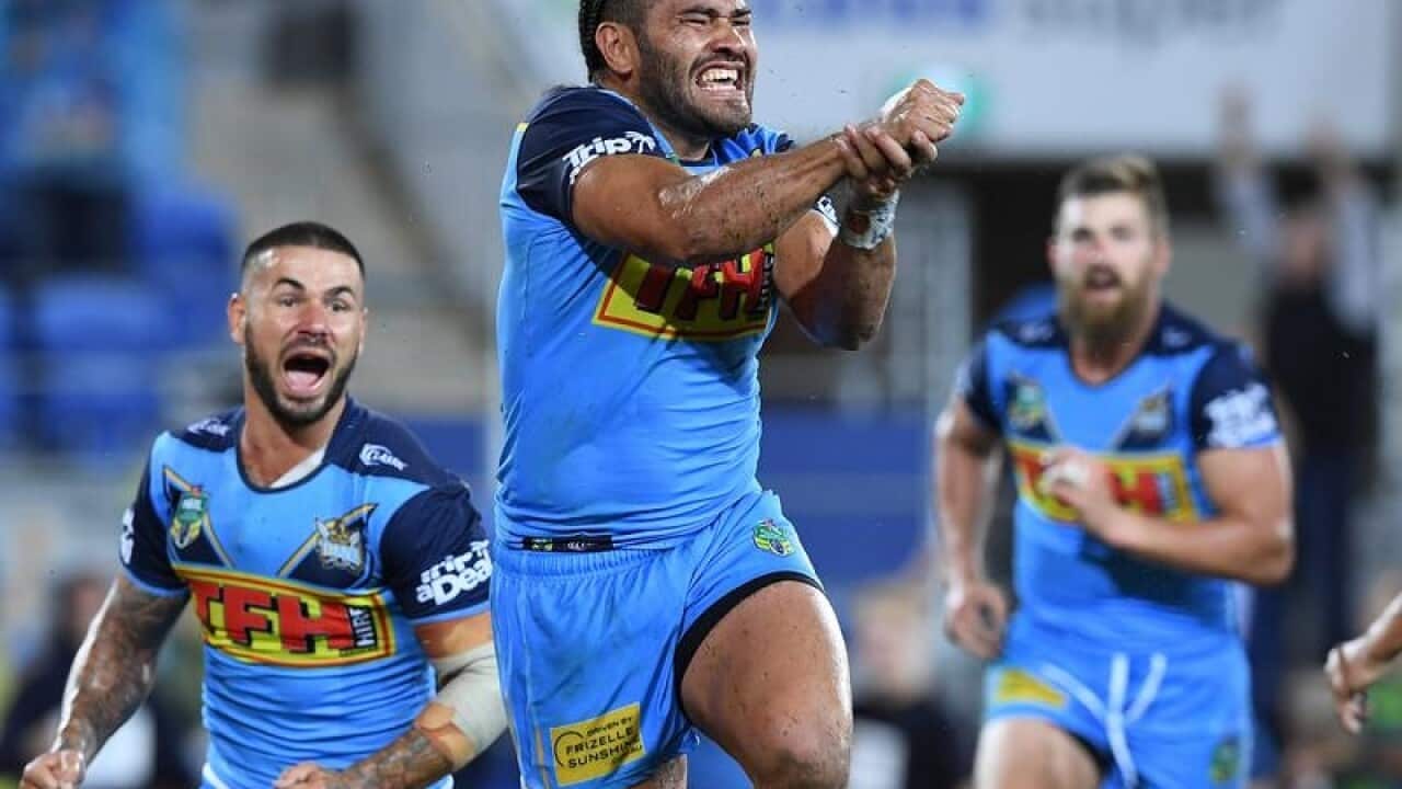 Konrad Hurrell celebrates for Gold Coast.