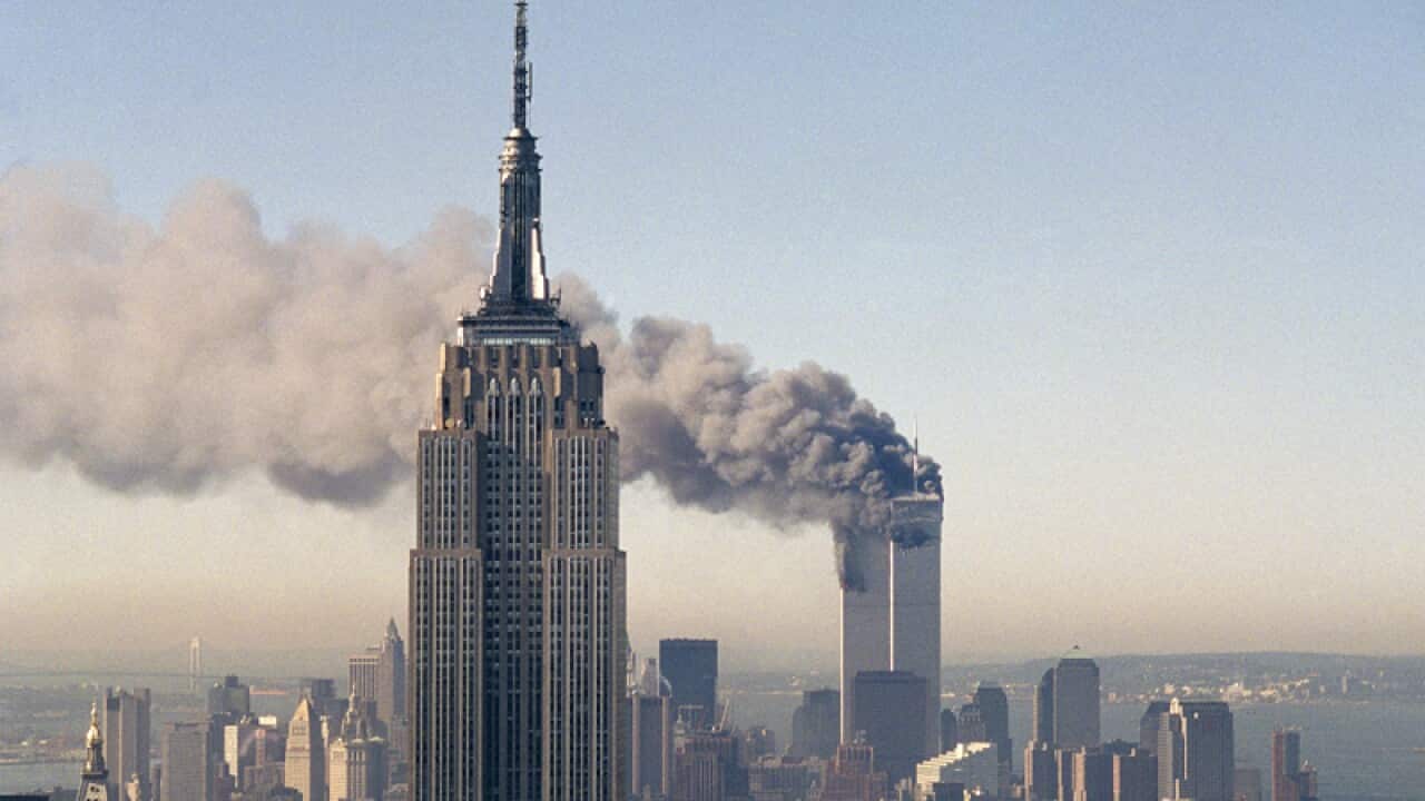 The World Trade Center burns on September 11, 2001.