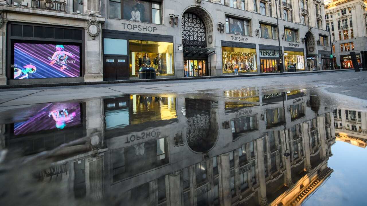 One of London's most famous shopping streets, Oxford Street, is deserted and shops are closed.