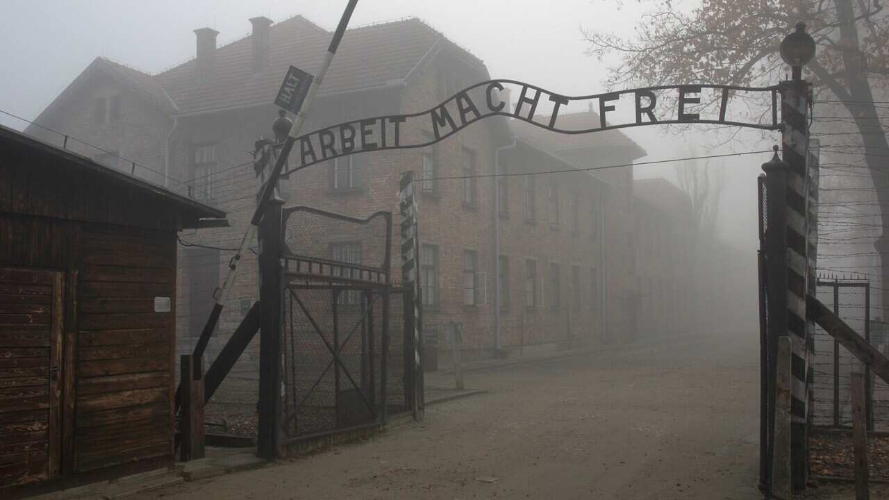 The 'Arbeit macht Frei' gate ('Work sets free) at the former German Nazi concentration and extermination camp Auschwitz
