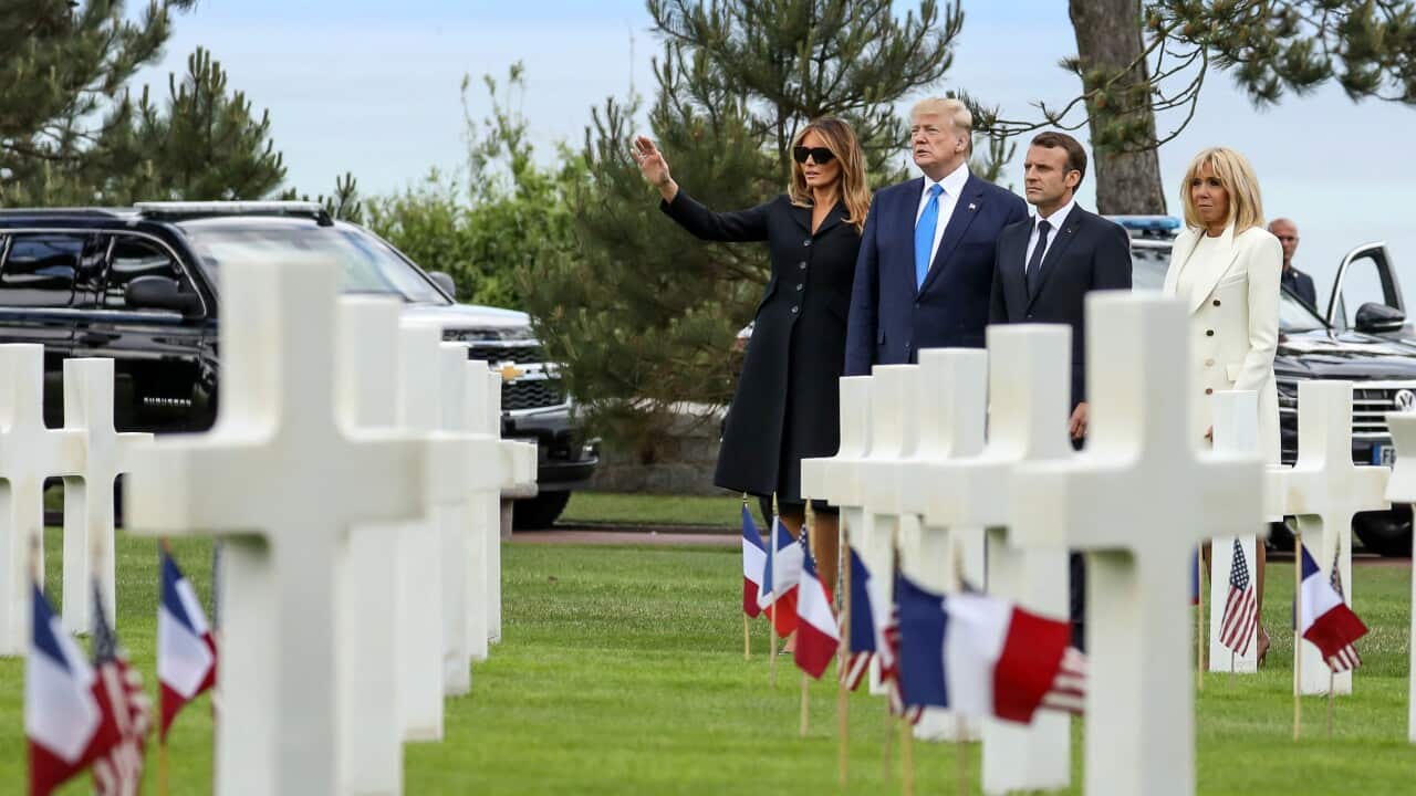 US First Lady Melania Trump, US President Donald Trump, French President Emmanuel Macron and French President's wife Brigitte Macron.