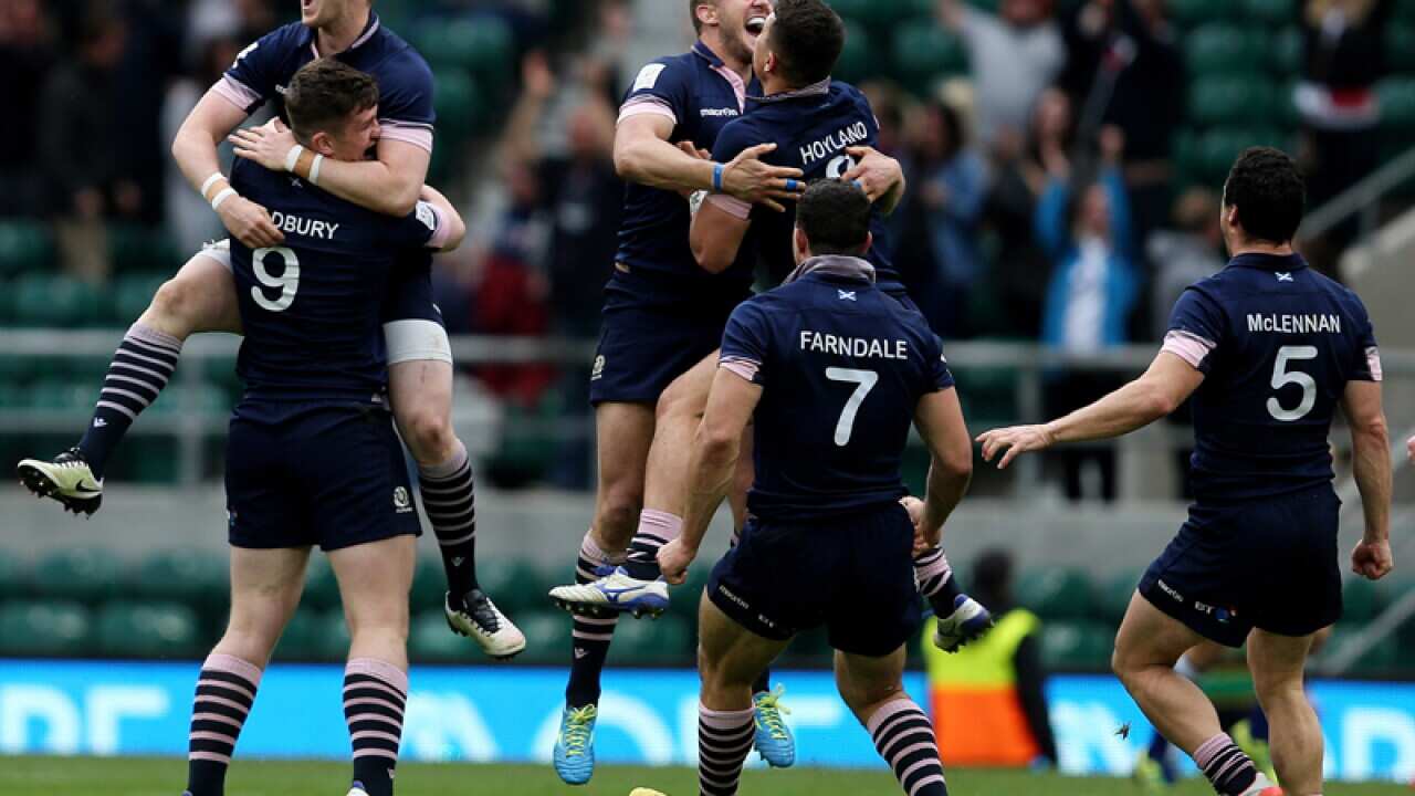 Scotland players celebrate at Twickenham Stadium