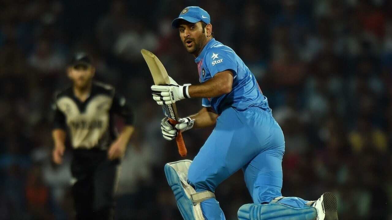 India's batsman Mahendra Singh Dhoni plays a shot during the World T20 cricket tournament match between India and New Zealand at The Vidarbha Cricket Association Stadium in Nagpur