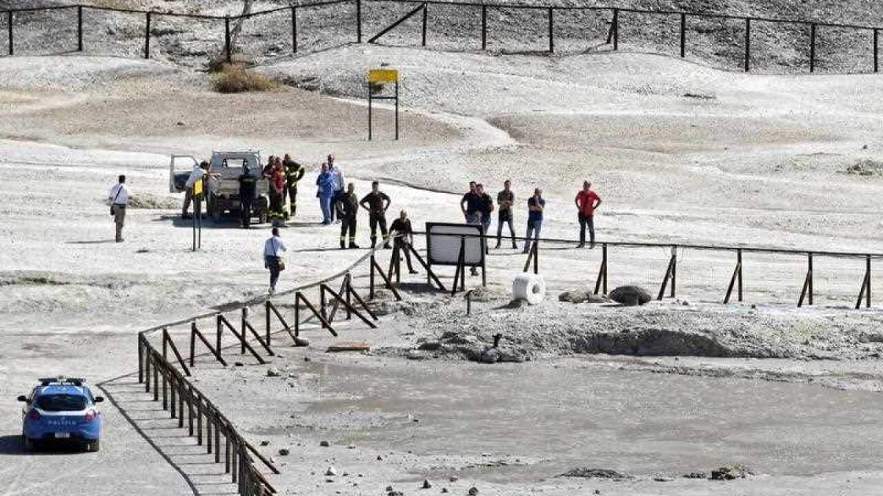 Rescue personnel stands at Solfatara di Pozzuoli where three people died in the crater at Pozzuoli, Naples, Italy, 12 September 2017.