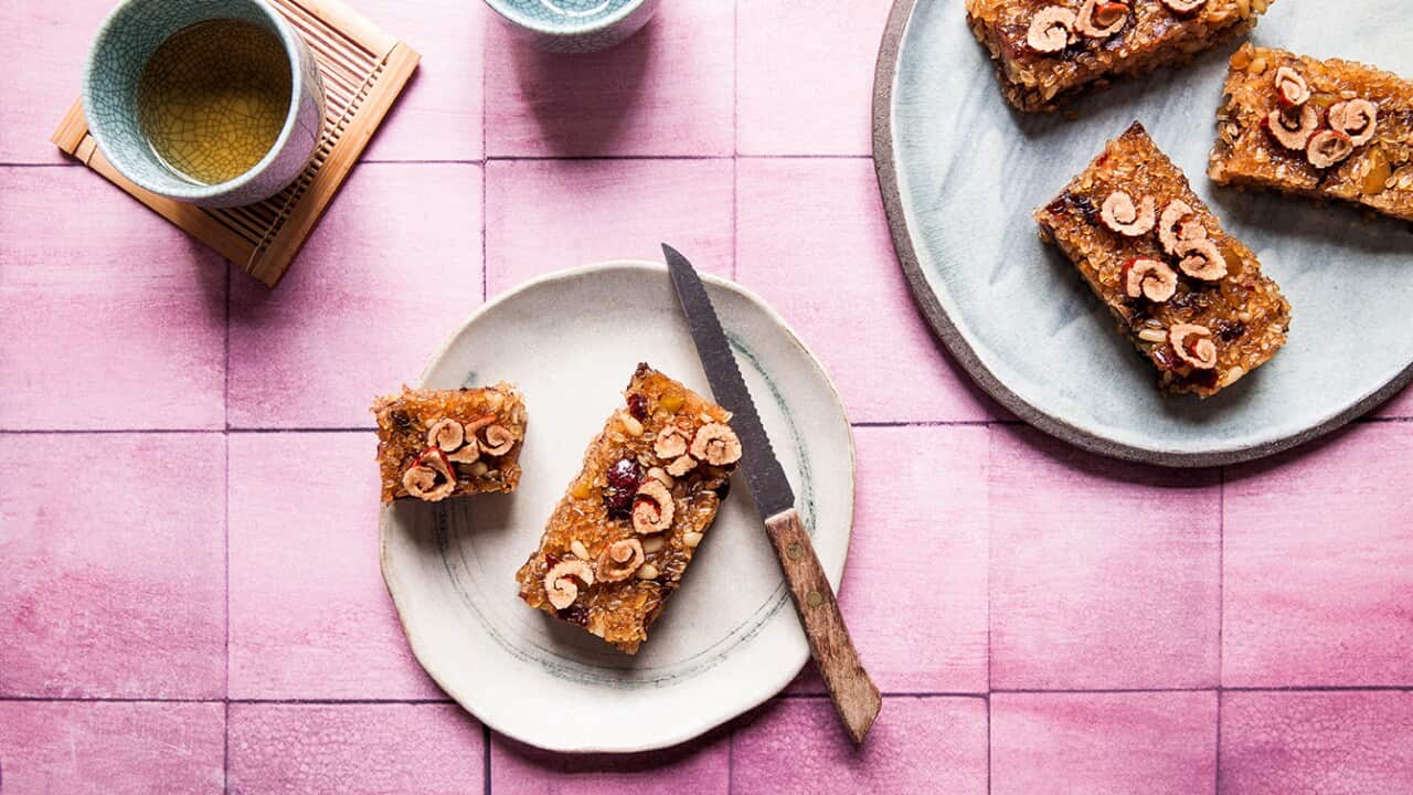 Sweet sticky rice with fruit, nuts and honey