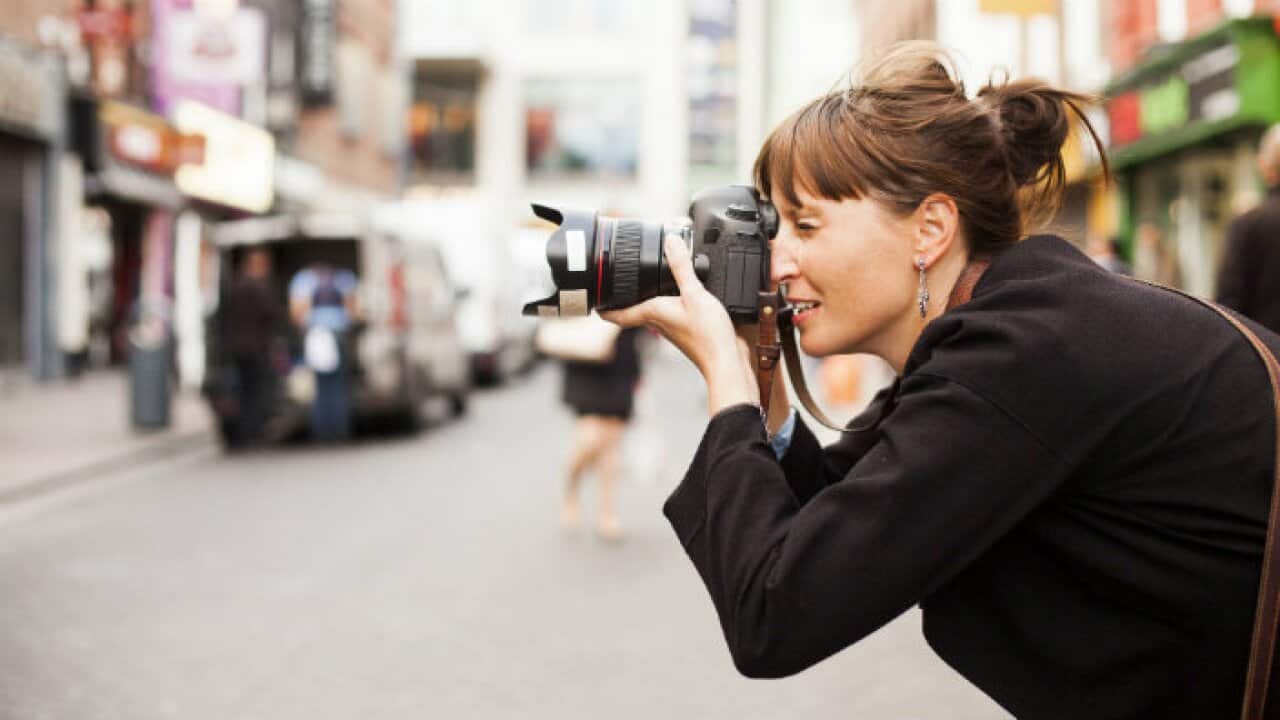 Lady photographer in action