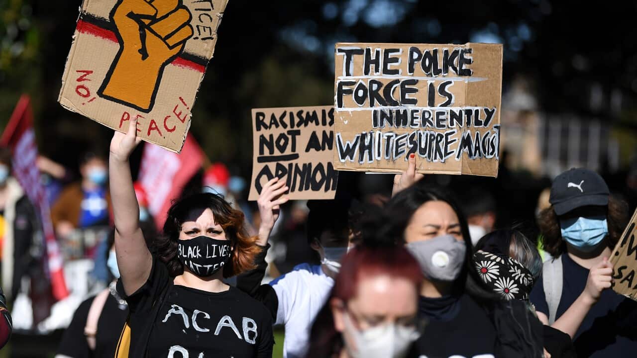 Protesters participate in a Black Lives Matter (BLM) rally at The Domain in Sydney, Sunday, 5 July, 2020.