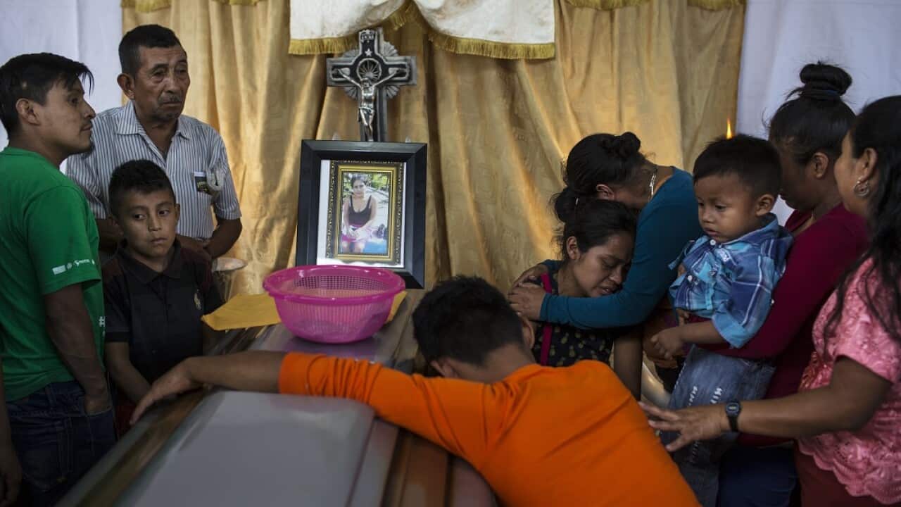 Relatives mourn the dead as prosecutors order a probe into whether evacuation protocols were followed properly in Sunday's deadly volcanic eruption.