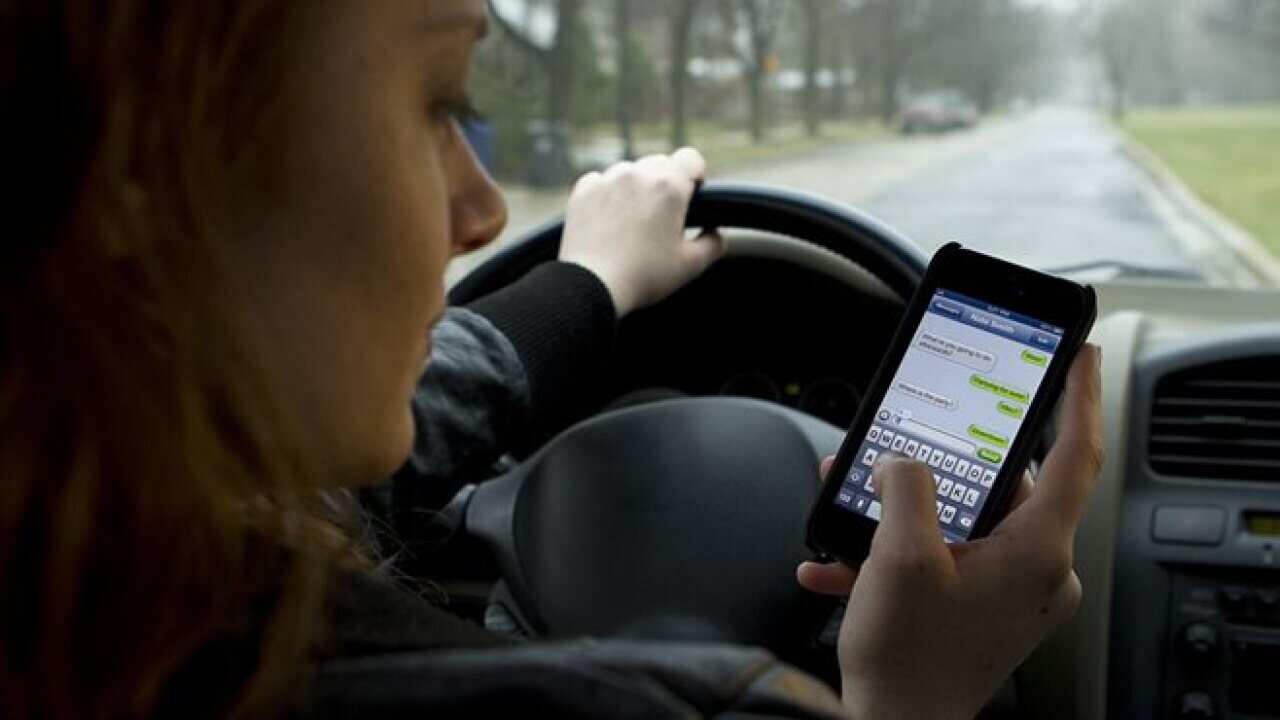 Red-light-style cameras will be used to detect texting drivers in NSW. Source