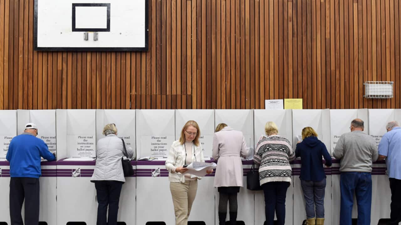 Voters cast their ballots