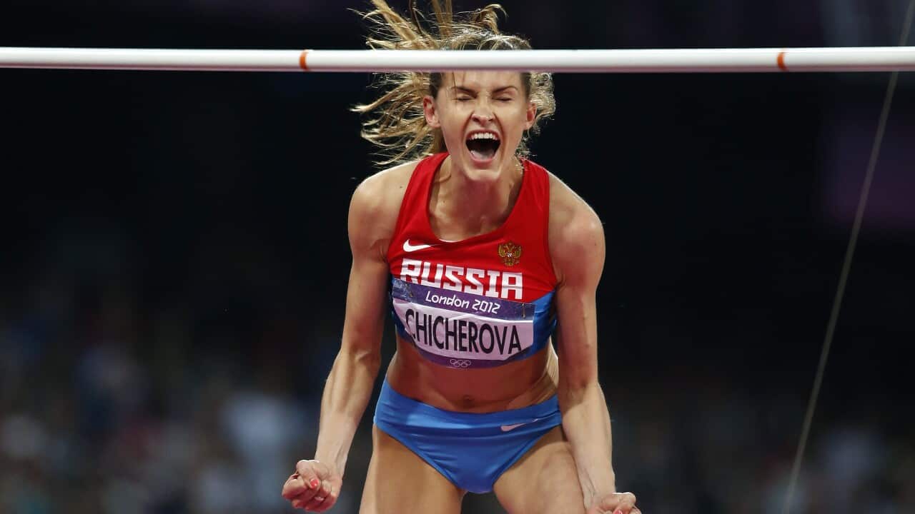 Russia's Anna Chicherova celebrates