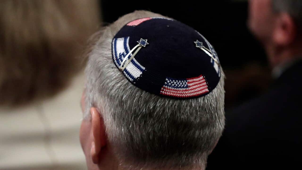A guest wears a special kippah at joint remarks by US President Donald Trump and Israel Prime Minister Benjamin Netanyahu