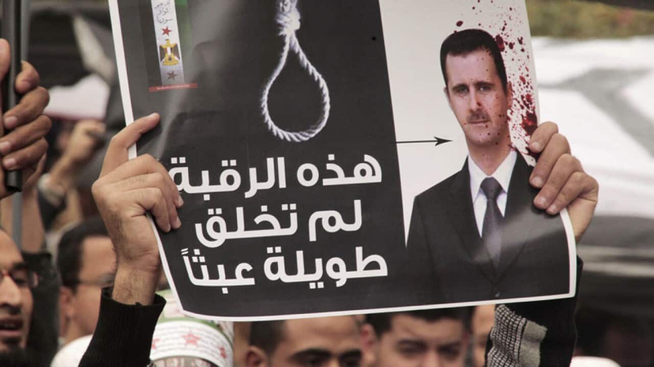 Top general close to Syria's Assad defects