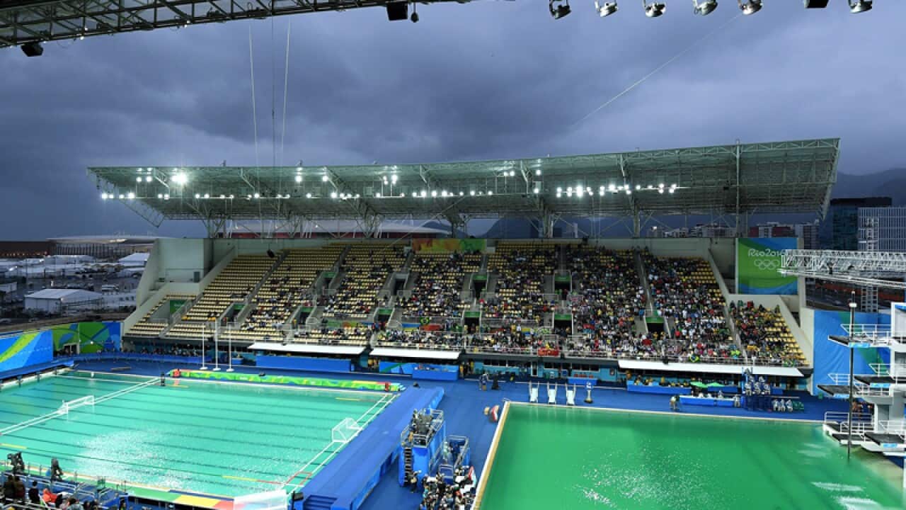 Green water is seen at the Maria Lenk Aquatics Centre