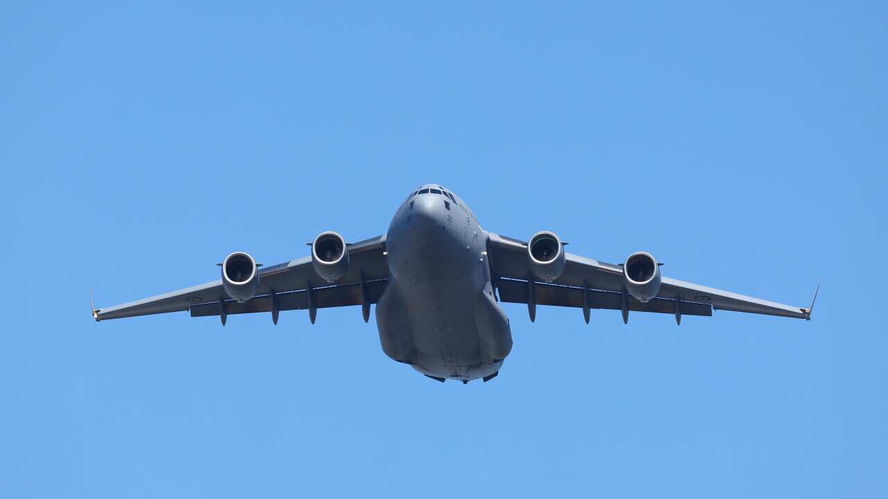 Royal Australian Air Force RAAF practice flypast over the city of Brisbane