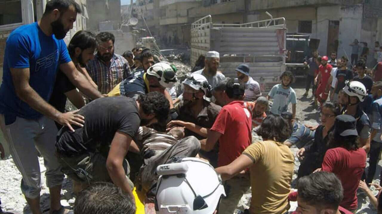 The aftermath of an an airstrike in the northern Syrian town of Ariha
