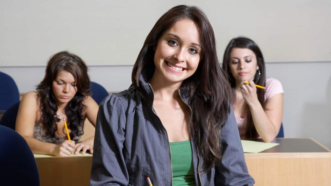 Portrait of female student in class