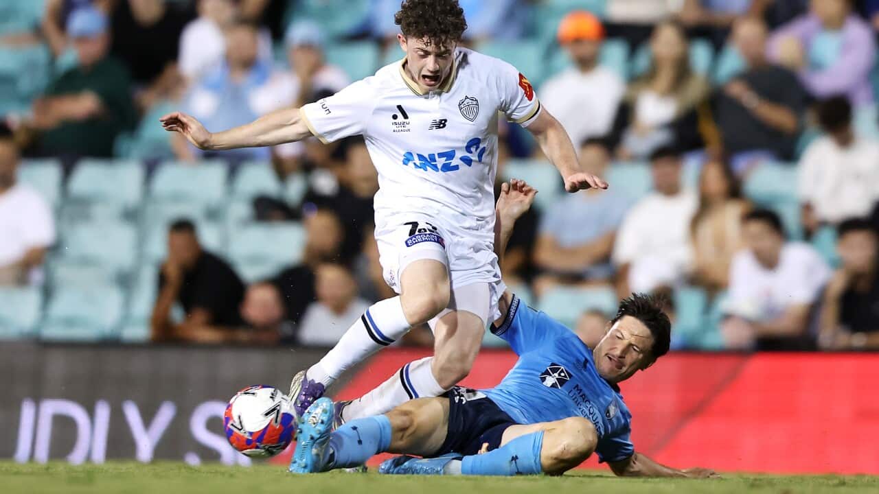 Jesse Randall of Auckland FC is tackled by Joe Lolley of Sydney FC during the A-League Men’s match between Sydney FC and Auckland FC in Liechhardt Oval in Sydney, Tuesday, February 17, 2026