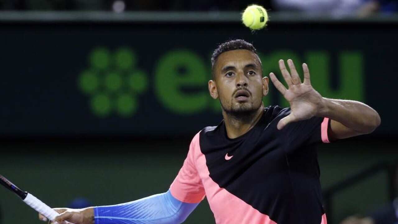A file image of Nick Kyrgios, of Australia, returning a shot.