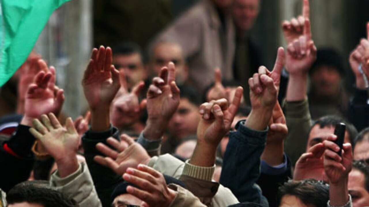 hamas_rally_airstrikes_gaza_0301_B_AP_1751410937