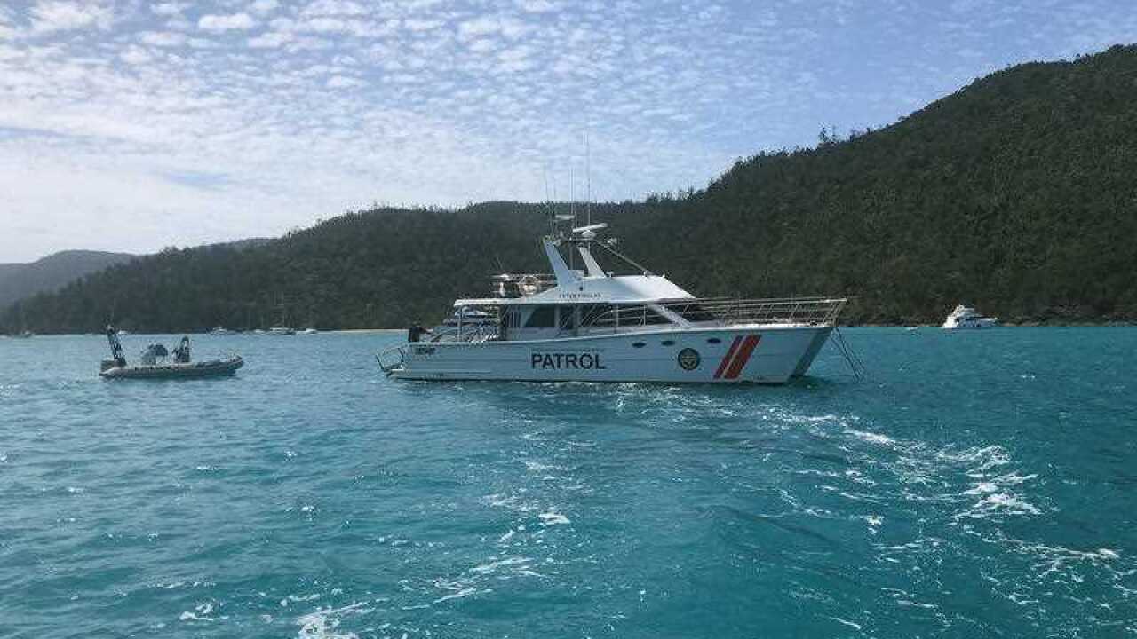 Supplied image of Queensland Boating and Fisheries Patrol boats patrolling Cid Harbour following two shark attacks, Friday, September 21, 2018.