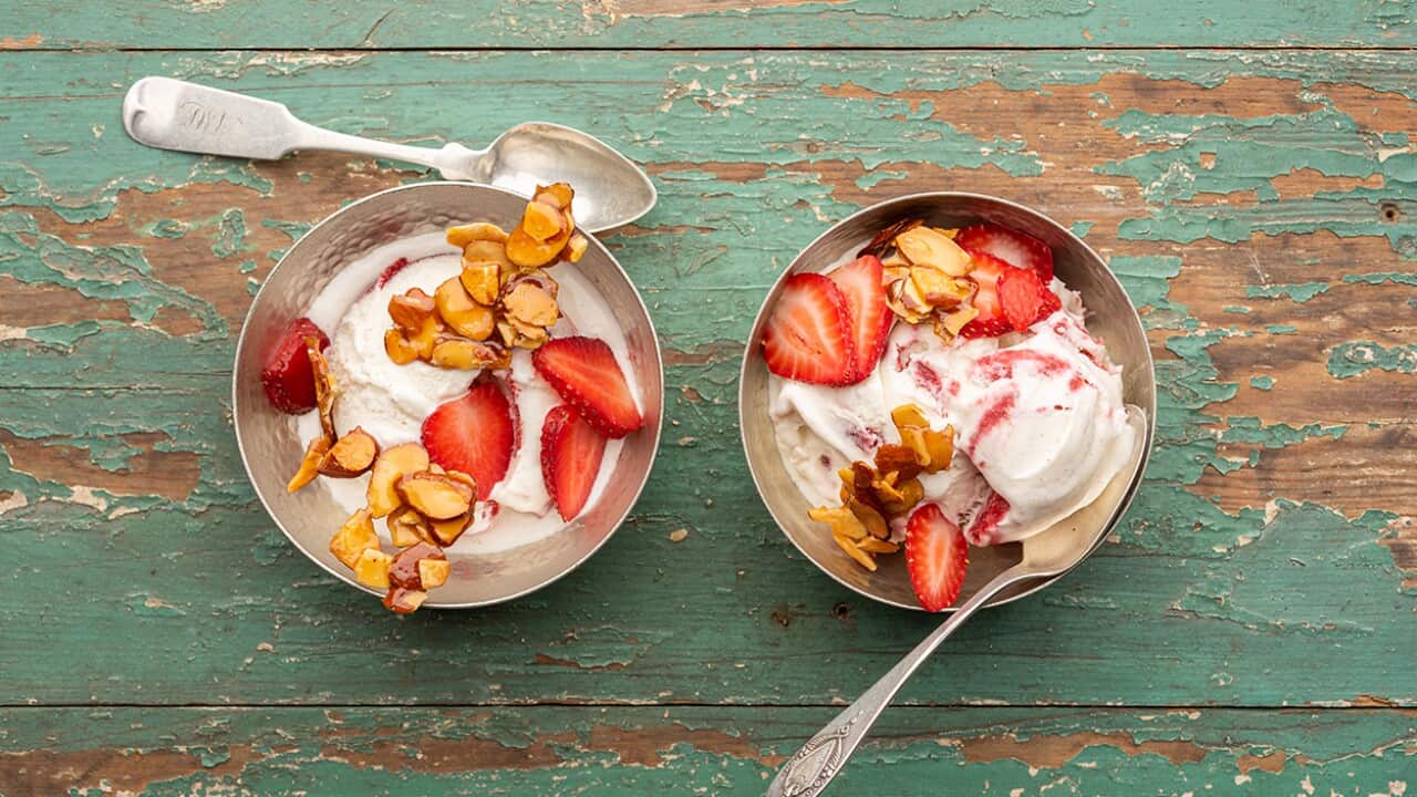Strawberry rippled ice-cream with candied almonds