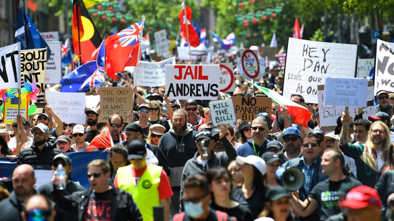 People participate in a 'The Worldwide Rally for Freedom' protest against mandatory vaccinations and lockdown measures in Melbourne.