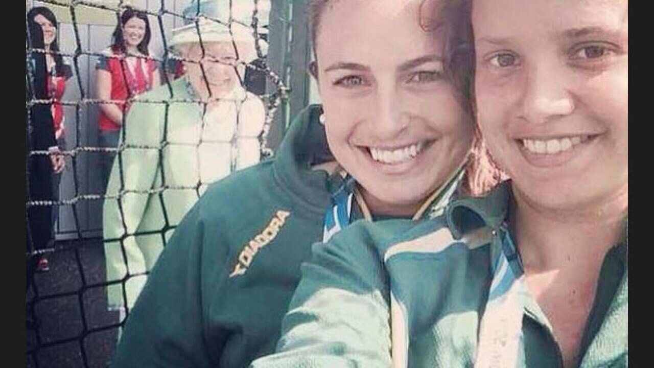 Hockeyroos photobombed by the Queen