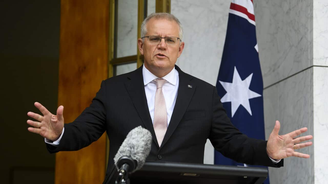 Australian Prime Minister Scott Morrison speaks to the media
