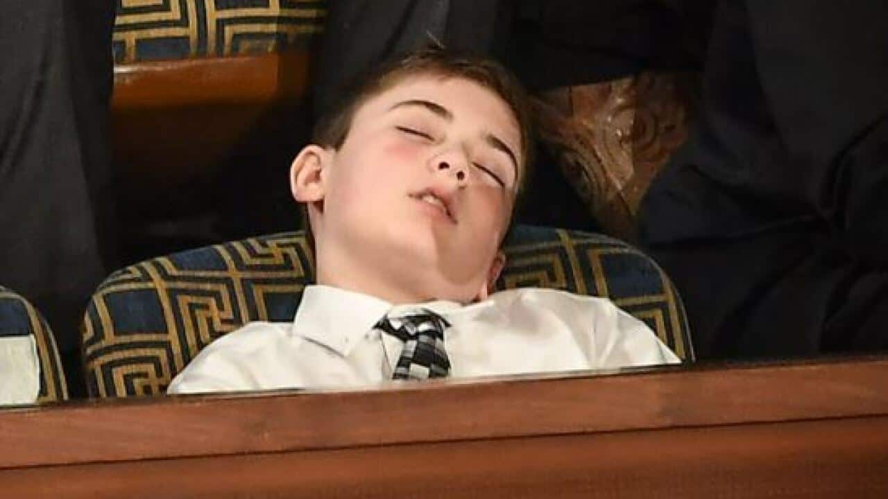 Joshua Trump has won fans for taking a nap.