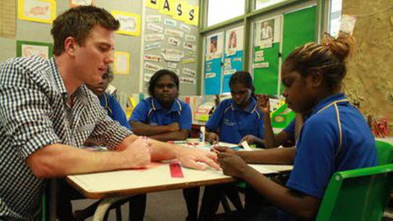 Teachers work with students at the Jabiru Area School in the Northern Territory.