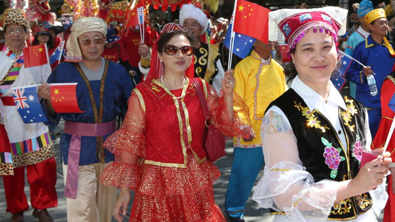 People participate in a cultural parade in Melbourne