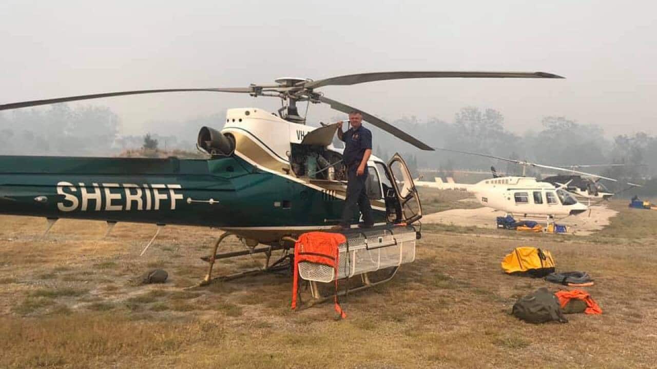 Firefighters prepare to take to the skies as NSW's bushfire threat soars.
