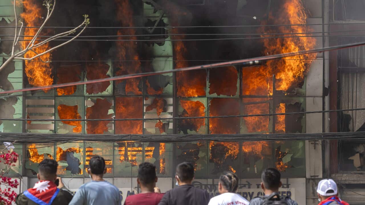 Nepal's pro-monarchy supporters clash with riot police in Kathmandu