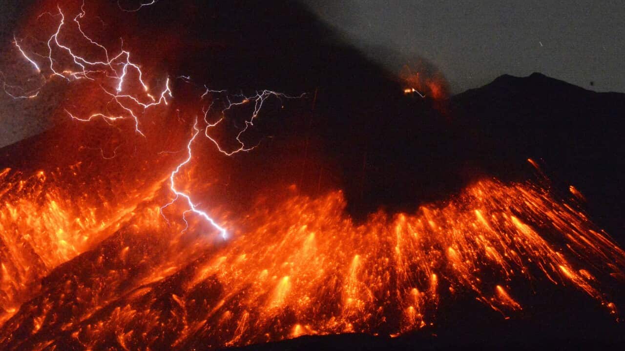 Lightning flashes above flowing lava as Sakurajima, a well-known volcano, in southern Japan.