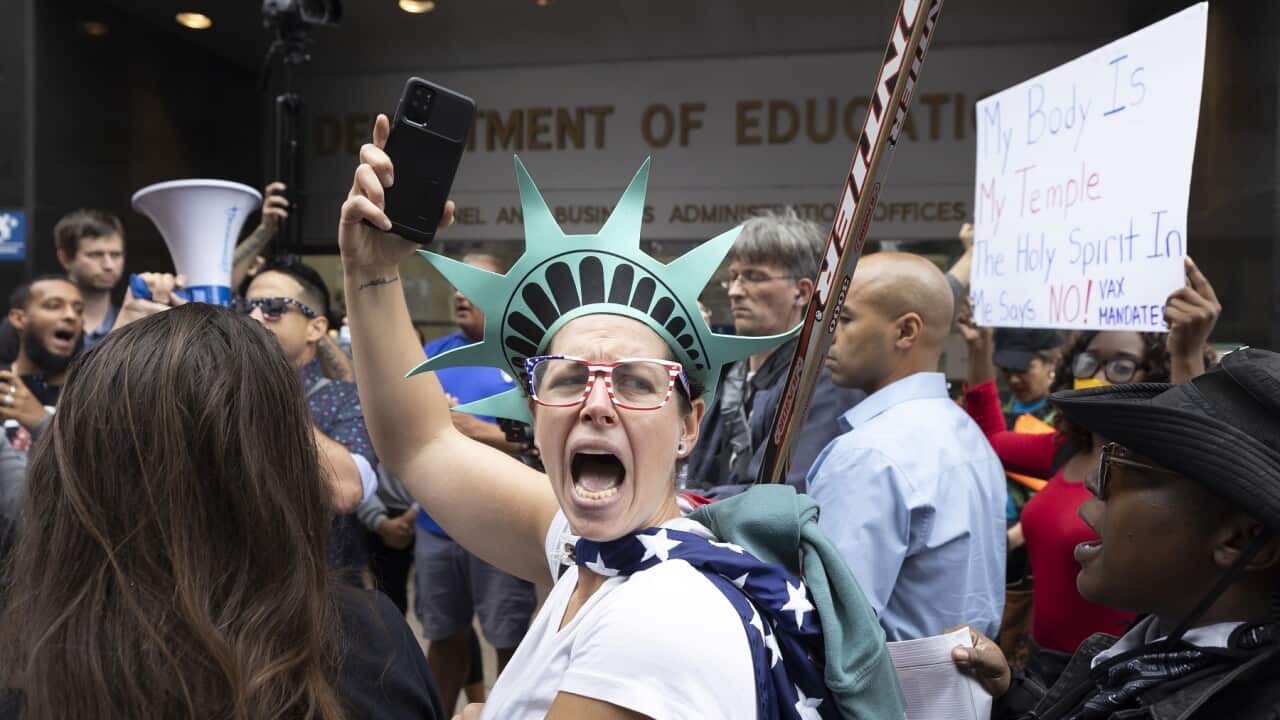 People protest against New York City’s COVID-19 vaccine mandate for public school employees
