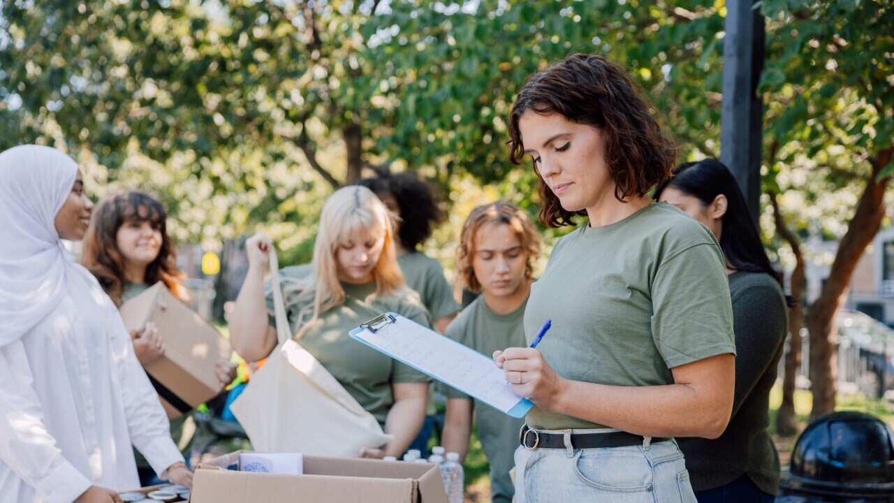 Community services, young team of people helping the local community