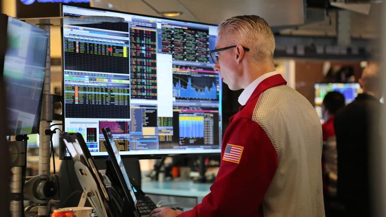 Wall St sees gains after tariffs relaxed (Getty)