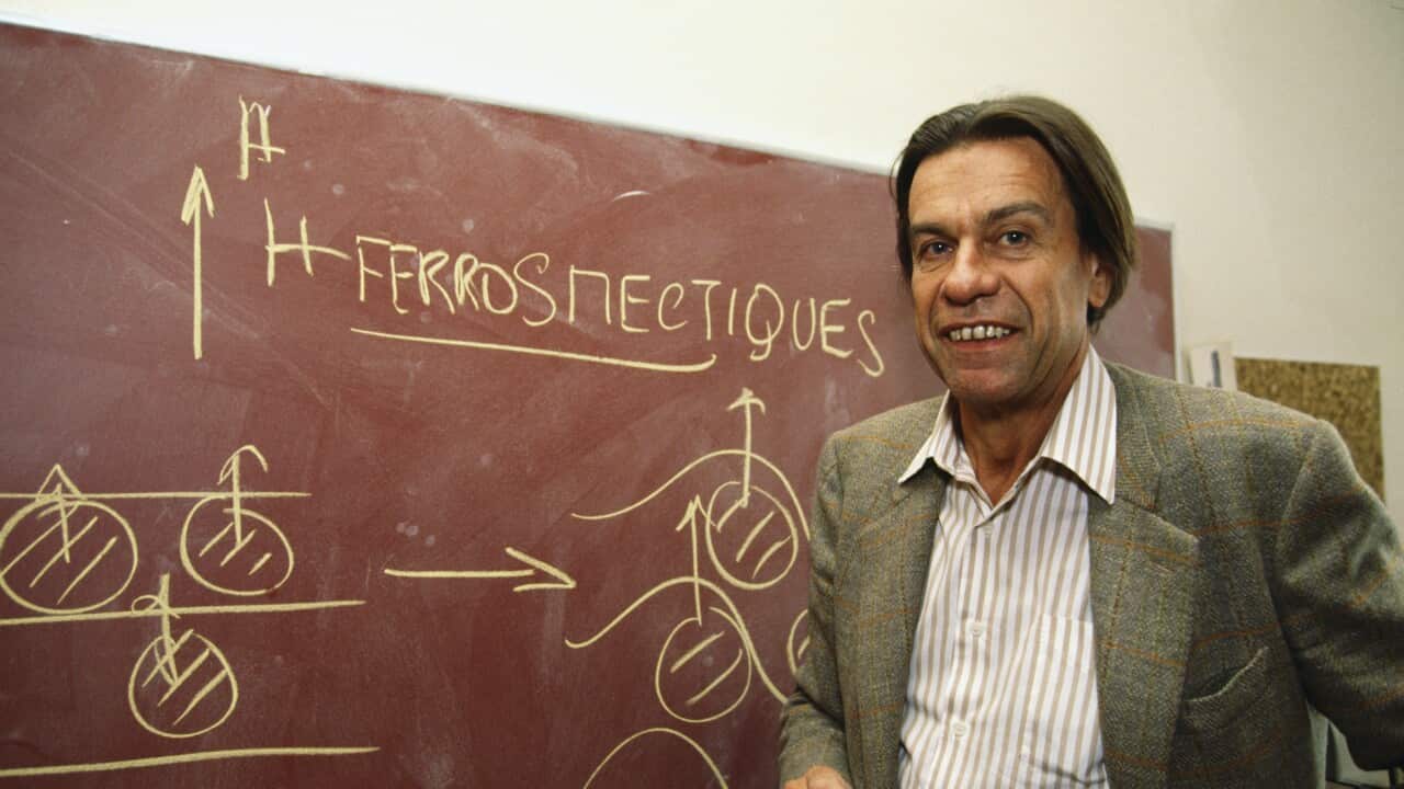 Physicist Pierre-Gilles de Gennes at Chalkboard