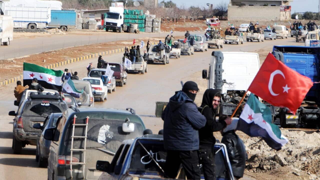 Members of the Turkey-backed Free Syrian Army in the Syria city of Azez, near the Syrian-Turkish border.