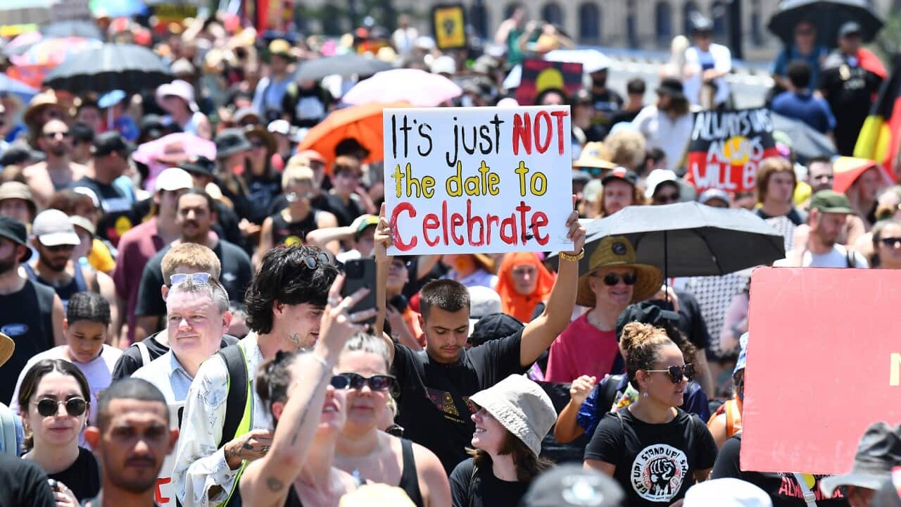 Australians attend a Brisbane Invasion Day rally.