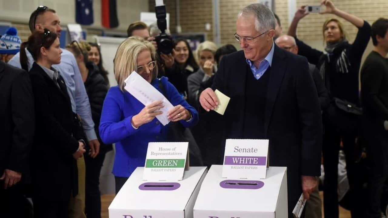 Malcolm Turnbull and his wife Lucy cast their vote at a voting booth in his electorate of Wentworth in Sydney,