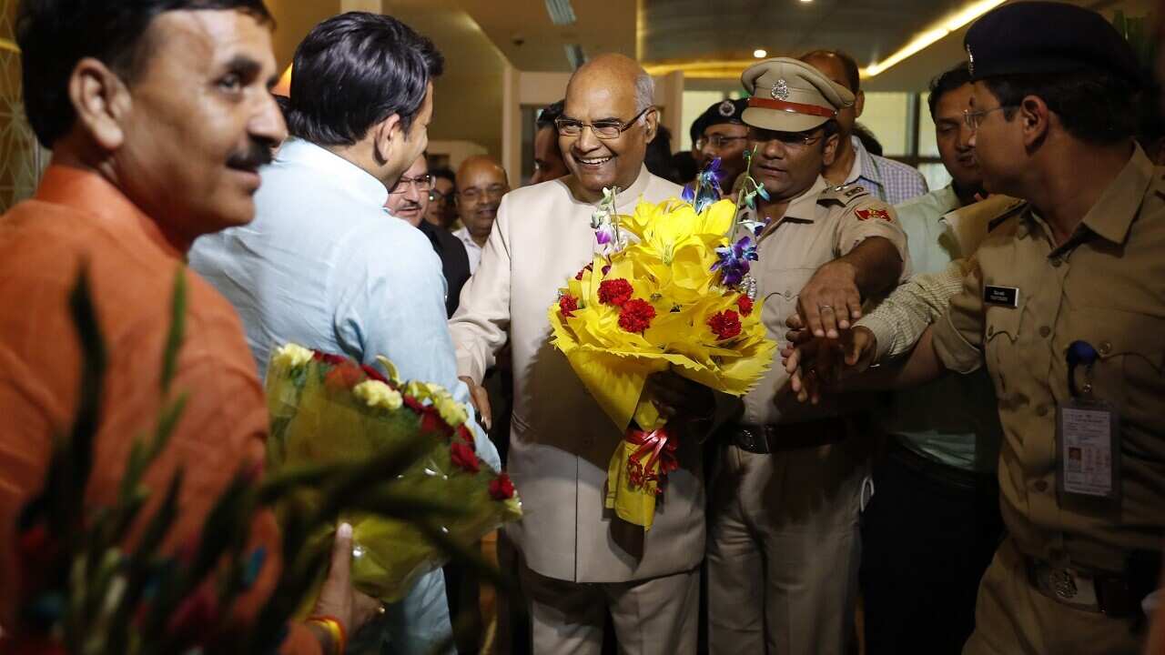 Bihar Governor Ram Nath Kovind, center, arrives at the airport in New Delhi, India, Monday, June 19, 2017.