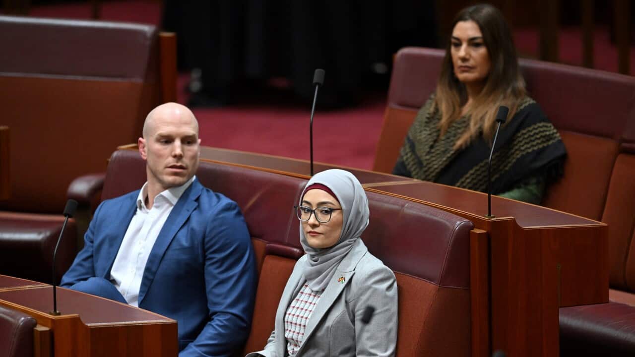 Senator Fatima Payman sits with Independent Senator David Pocock and Australian Greens Senator Mehreen Faruqi after crossing the floor (AAP)