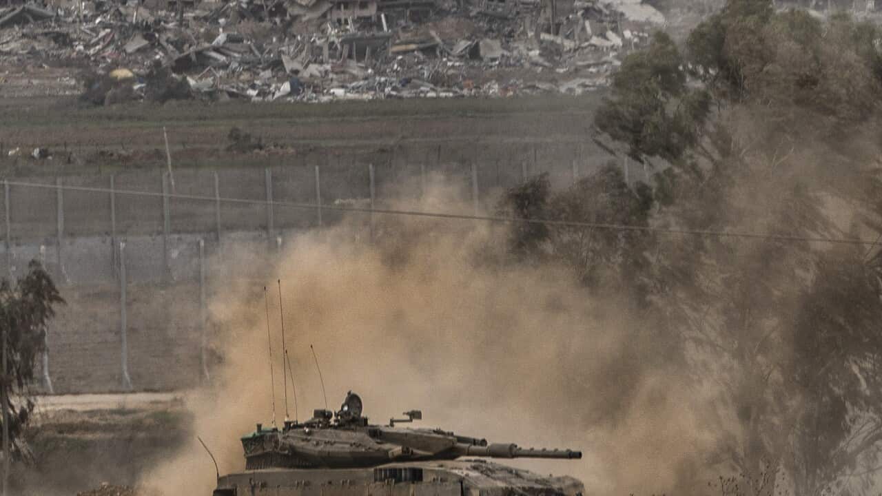 A tank moves near Gaza Strip.